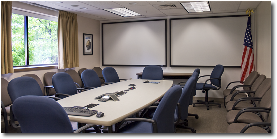 Conference room has separate cooling system & can host meetings for 20+ people.
